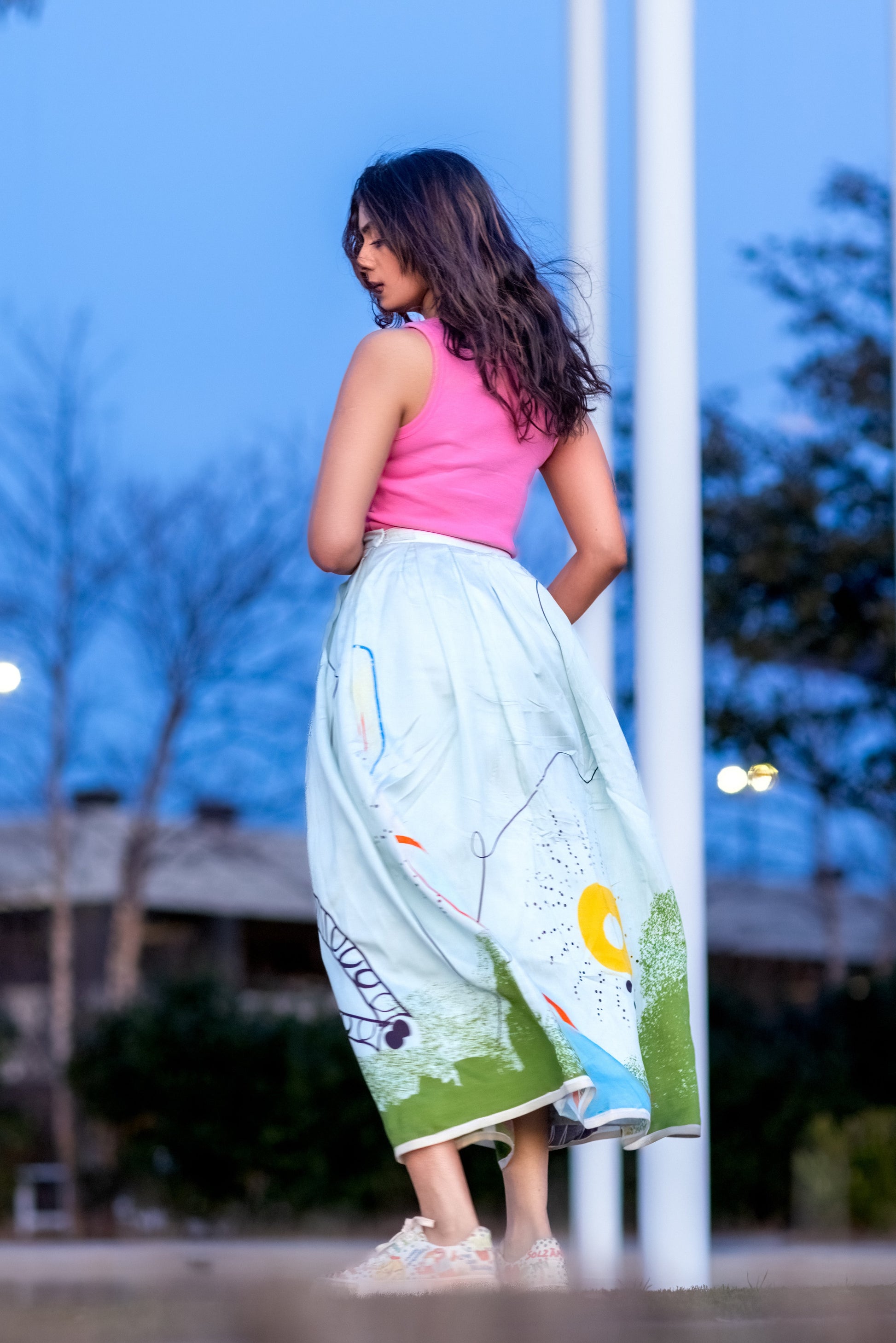 back view of limited edition silk box pleat midi skirt by independent designer Ojasi