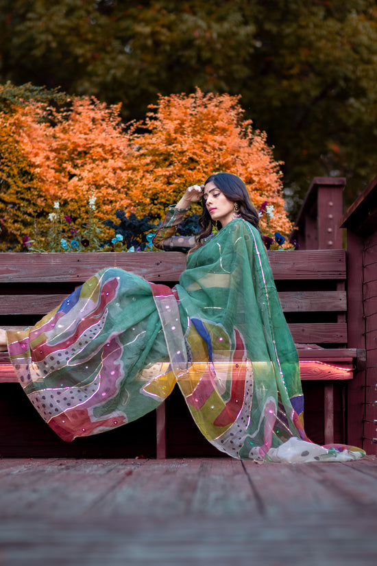 Chitra – Forest Green Pure Organza Silk Saree with Handpainted Abstract Art & Hand‑Embroidered Sequin Work