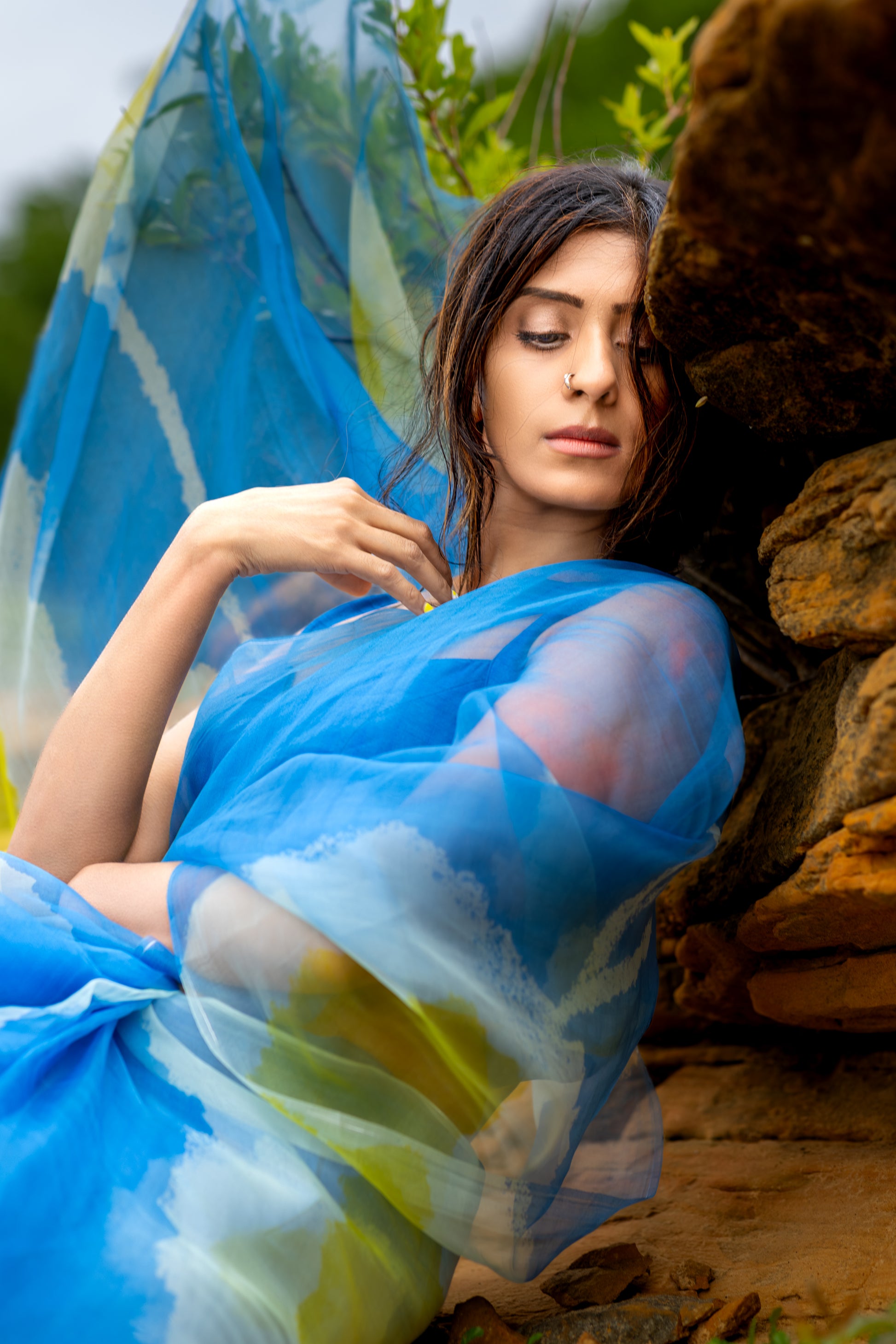 model wearing hand designed original abstract flower pattern organza saree outdoors