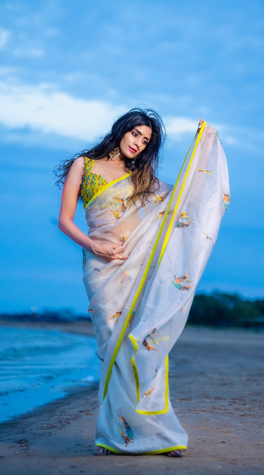 Nyra – Luxurious Hand-Embroidered Soft Cream Organza Saree with Customizable Raw Silk Blouse