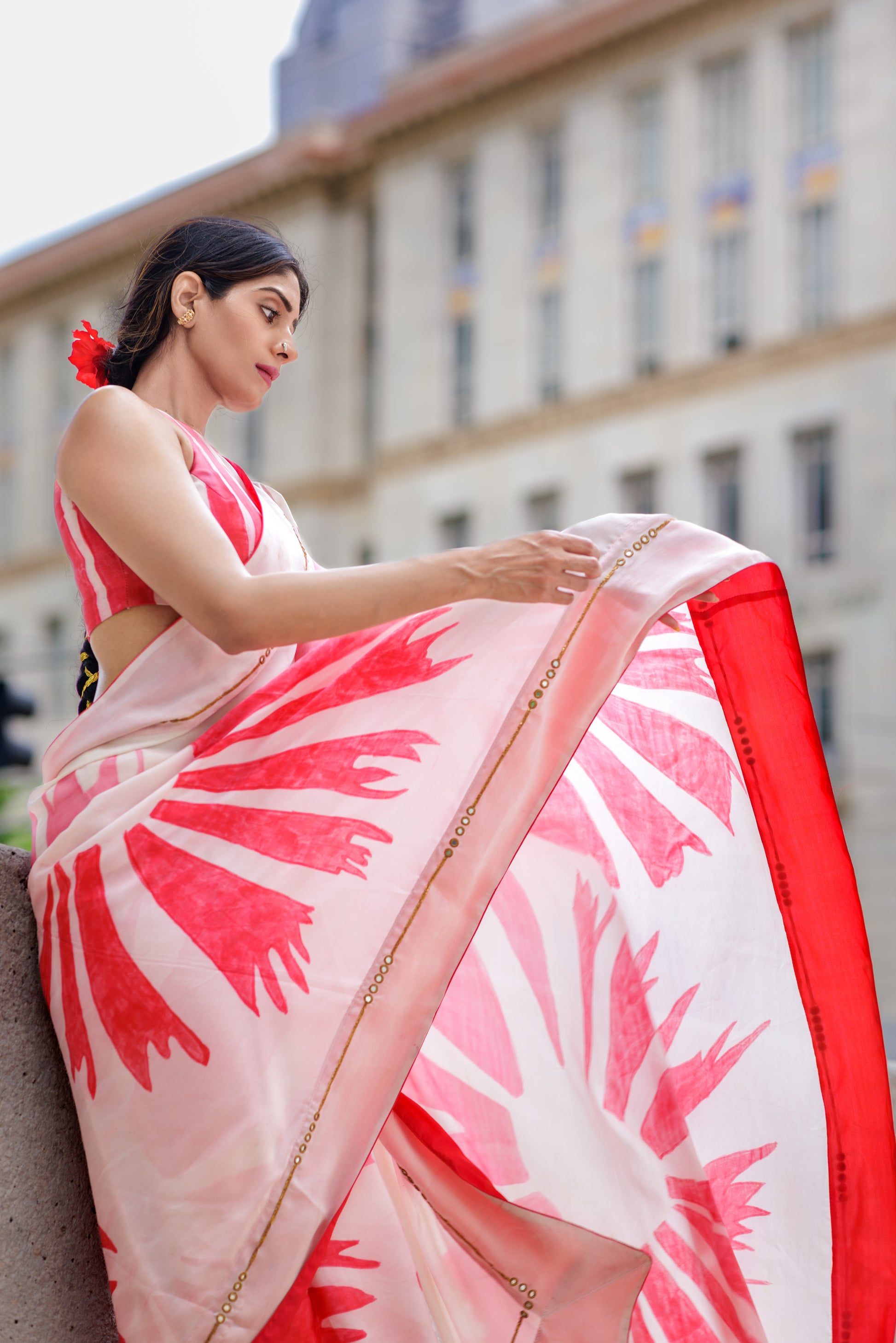model wearing satin silk handpainted saree by OJasi USA