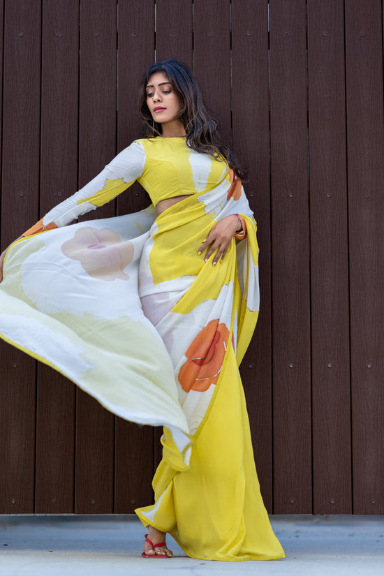 Model in premium designer printed saree by Ojasi design studio USA