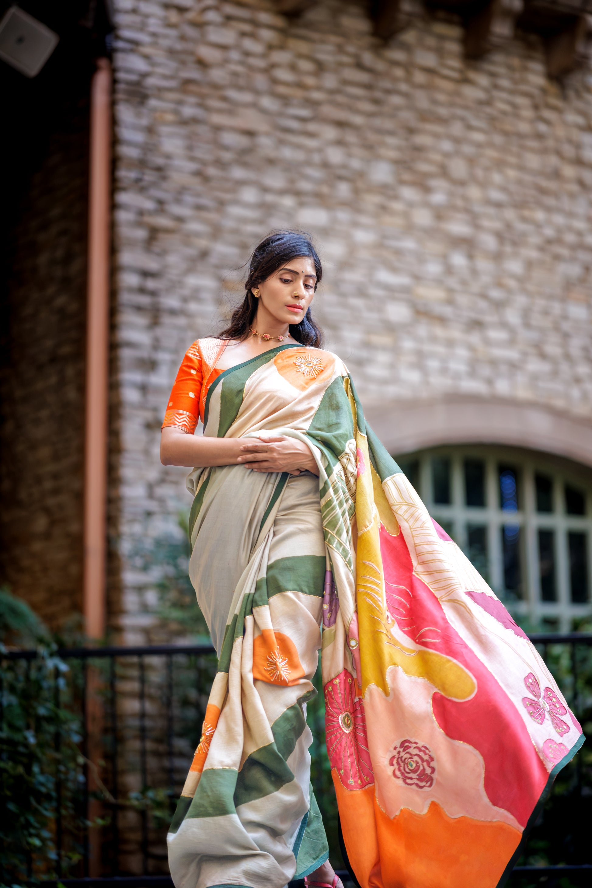 Model wearing handpainted kalamkari saree at the festive event designed by Ojasi design studio