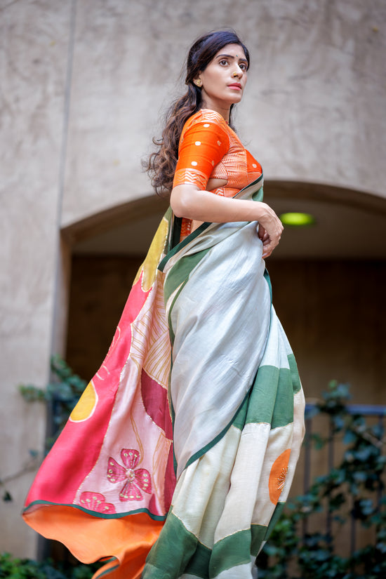 south asian Indian model wearing authentic pen kalamkari saree handpainted and hand embroidered using sequin and pitta work