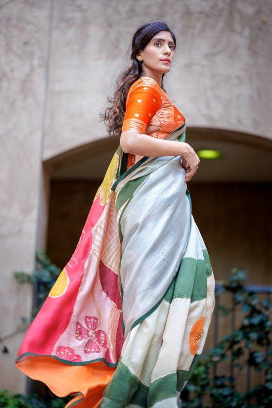 south asian Indian model wearing authentic pen kalamkari saree handpainted and hand embroidered using sequin and pitta work